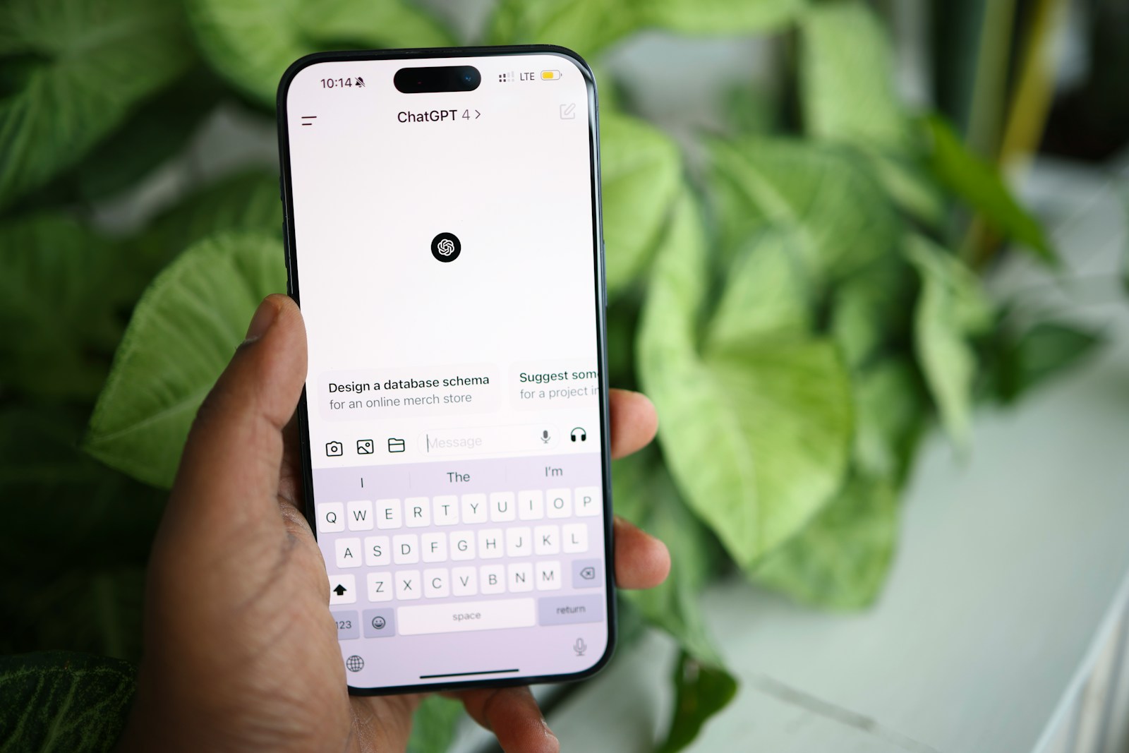 a person holding a cell phone in their hand | Prompt Writing Techniques
