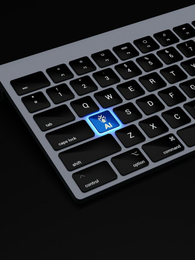 a black keyboard with a blue button on it